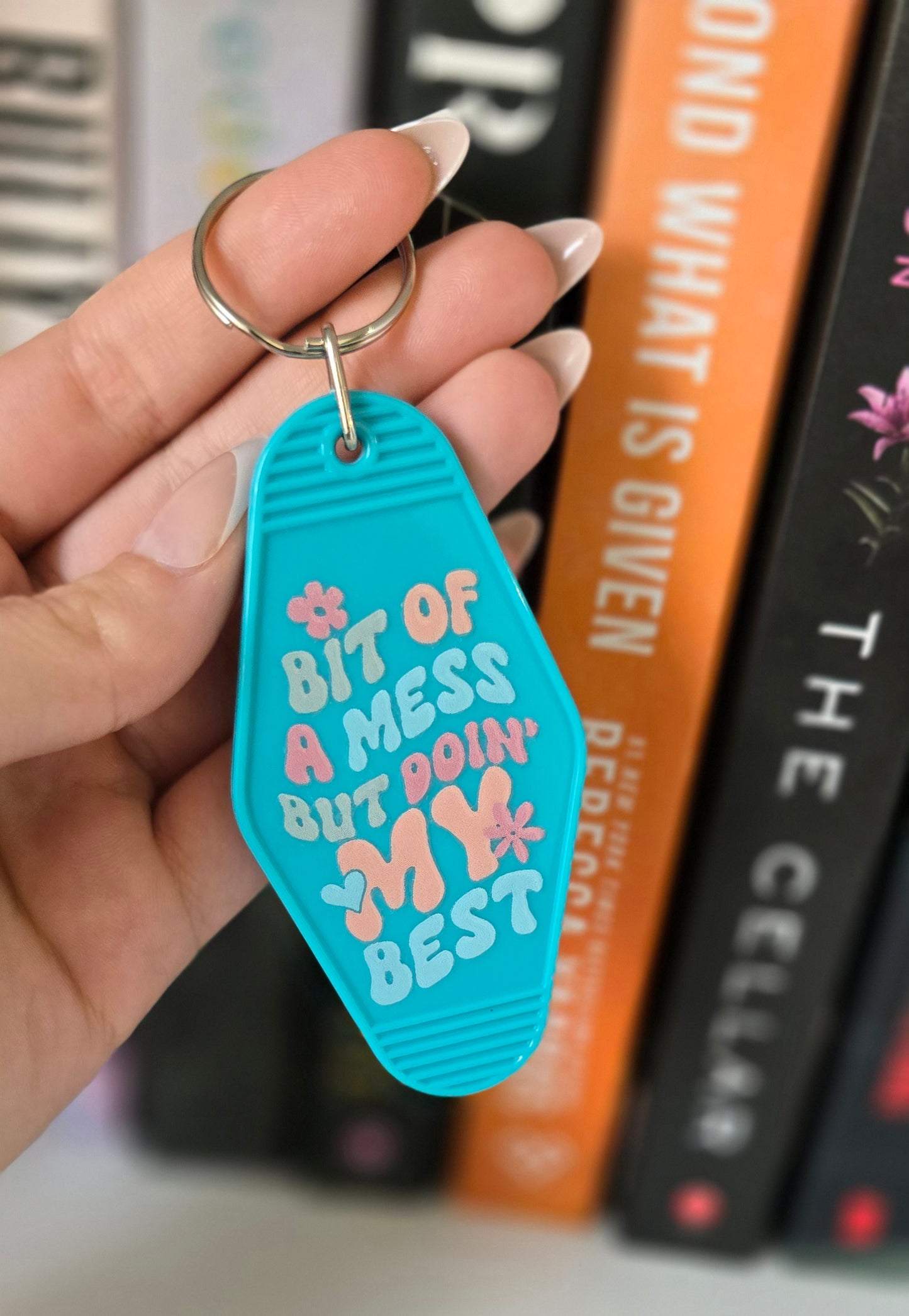 Bit Of A Mess Motel Keychain